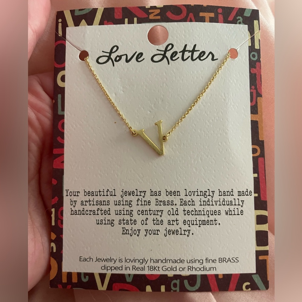 Gold “V” necklace